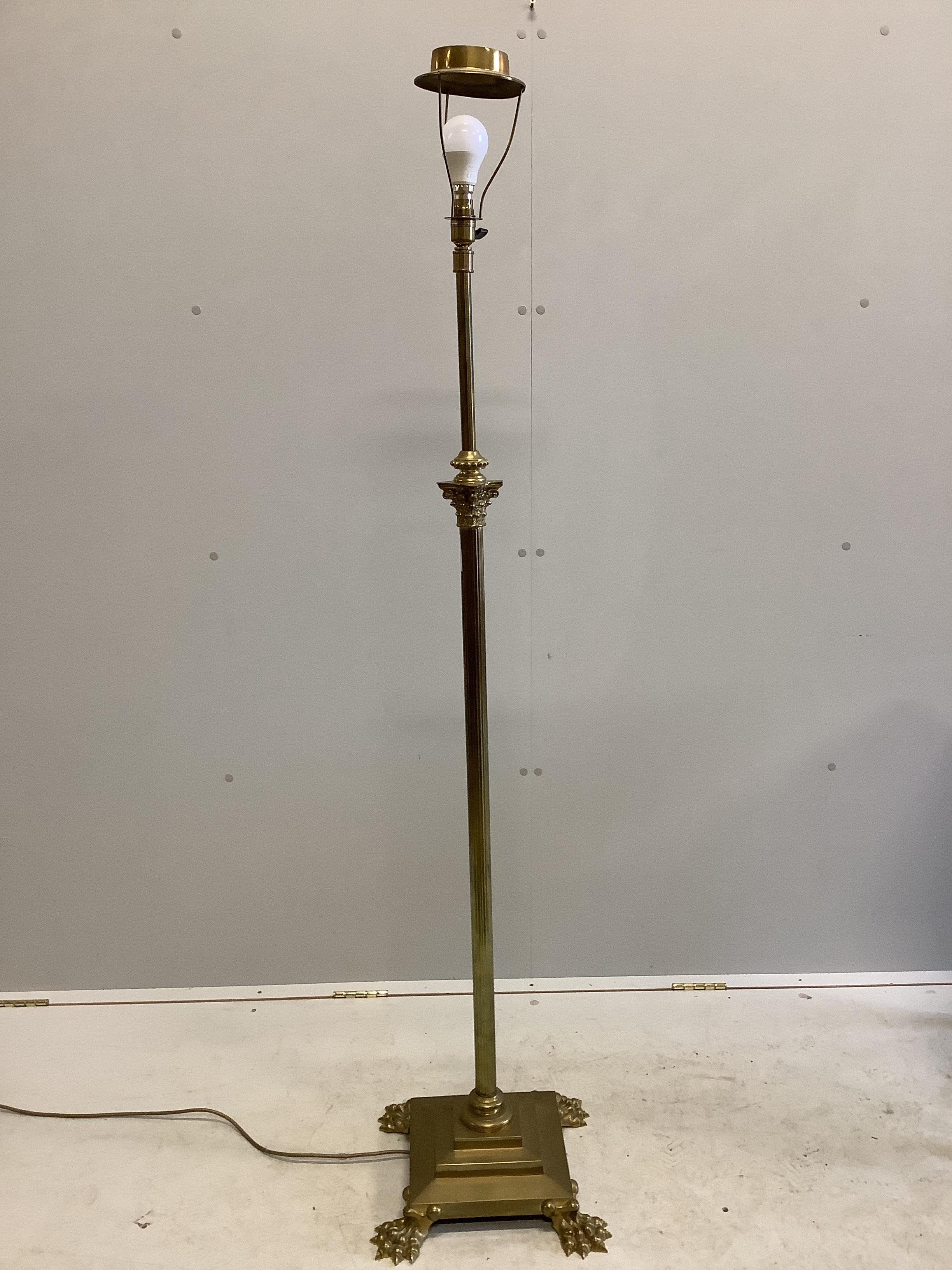 A Corinthian column brass telescopic lamp standard